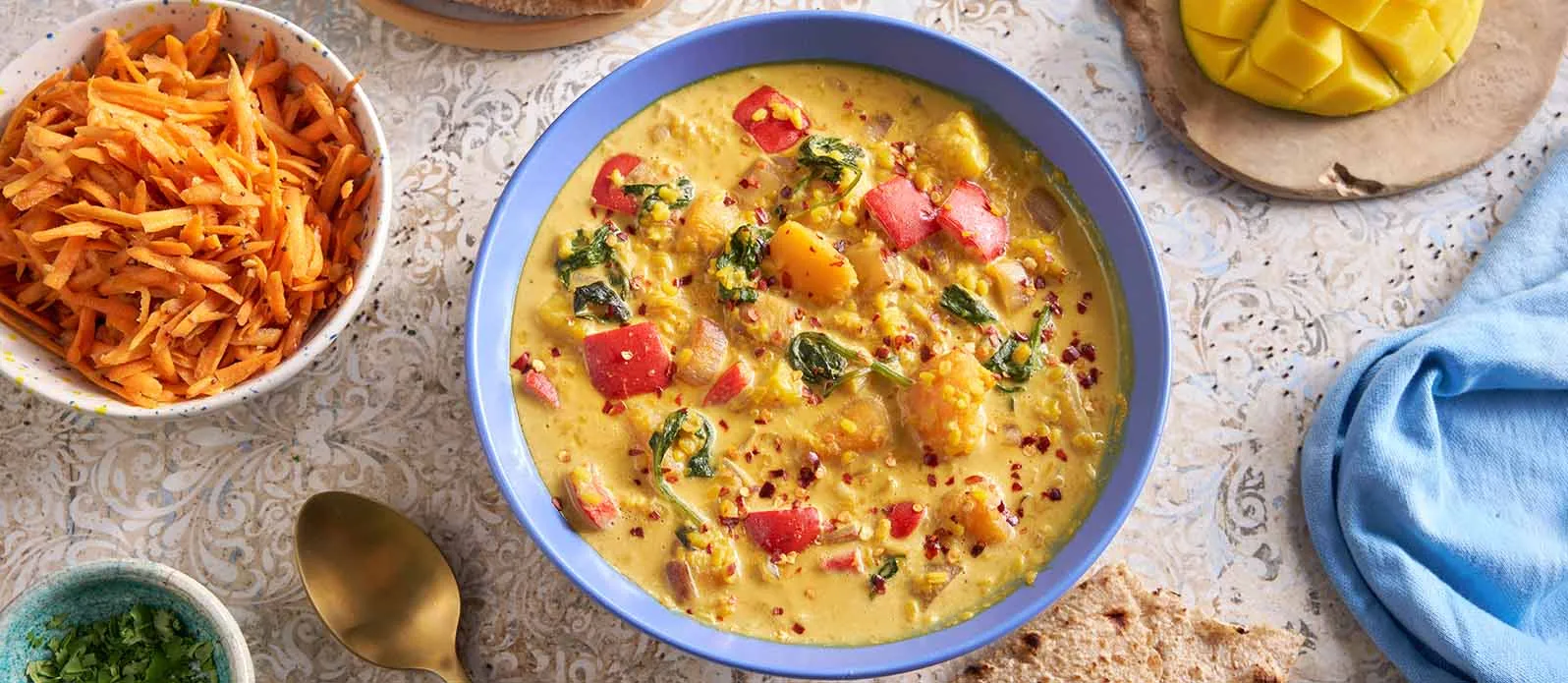 Moong dhal med gresskar, mango og kokos