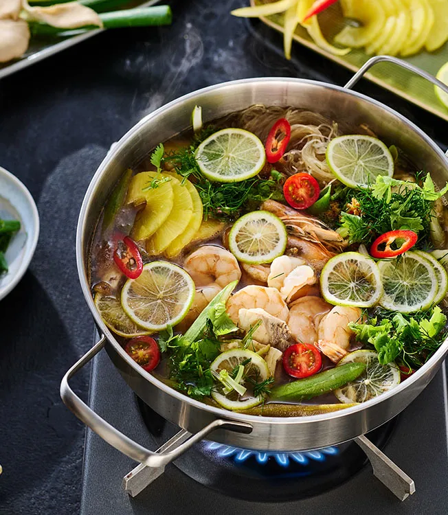 Vietnamesisk lẩu cá chua – fiske-hot pot